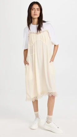 Simone Rocha T-Shirt Midi Dress With Camisole Front And Lace Trim 12 Simone Rocha T-Shirt Midi Dress With Camisole Front And Lace Trim -Shop Bop sroch302161f8aa 1677785488462 2 0. UX357 QL90