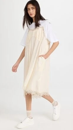 Simone Rocha T-Shirt Midi Dress With Camisole Front And Lace Trim 10 Simone Rocha T-Shirt Midi Dress With Camisole Front And Lace Trim -Shop Bop sroch302161f8aa 1677785488499 2 0. UX357 QL90